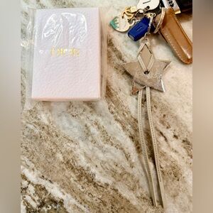 Dior Metallic Silver Around the World Star Keychain Star measures ~2.5” SEALED